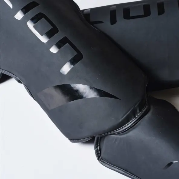 Protège-tibias et pieds Elion Extravagant Noir