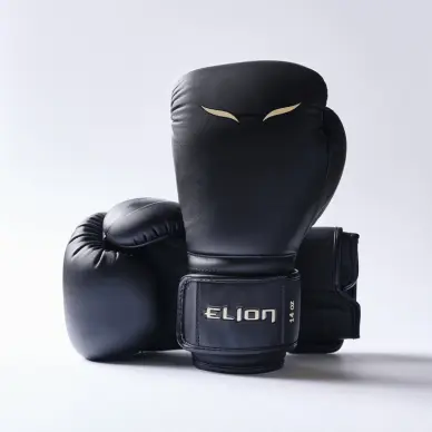 Gants de boxe ELION Uncage 10ème Anniversaire - Noir/Or